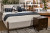 Benchcraft Dantenton Merlot California King Panel Bed
