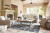 Ashley Beachcroft Beige Outdoor Sofa with Cushion