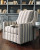 Ashley Kambria Ivory Black Swivel Glider Accent Chair