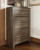 Ashley Juararo Dark Brown Queen Poster Bed with Mirrored Dresser, Chest and 2 Nightstands