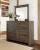 Ashley Juararo Dark Brown Queen Poster Bed with Mirrored Dresser, Chest and 2 Nightstands