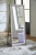 Ashley Evesen Black Floor Standing Mirror/Storage
