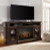 Ashley Roddinton Dark Brown 72" TV Stand with Electric Fireplace