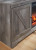 Ashley Wynnlow Gray 63" TV Stand with Electric Fireplace