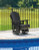 Ashley Hyland Wave Black Outdoor Swivel Glider Chair