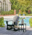 Ashley Sundown Treasure Black Outdoor Chair with End Table