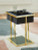 Ashley Rexwell Black Gold Finish Accent Table with Speaker