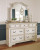Ashley Realyn Chipped White Queen Sleigh Bed with Mirrored Dresser, Chest and 2 Nightstands