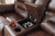 Ashley Stoneland Chocolate Reclining Loveseat with Console