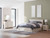Ashley Lawroy Light Natural King Panel Storage Bed, Dresser, Mirror and Nightstand B100/14/B2310/56S/58/60(2)/31/36/92