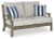 Ashley Rainier Ranch Brown Beige Outdoor Loveseat with Cushion