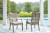 Ashley Rainier Ranch Brown Beige Outdoor Dining Table and 6 Chairs
