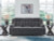 Ashley Greely Bend Steel Power Reclining Sofa with Drop Down Table