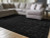 Ashley Gibbswell Black Washable 8' x 10' Area Rug
