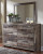 Benchcraft Derekson Multi Gray King Panel Bed with 2 Storage Drawers with Mirrored Dresser, Chest and Nightstand