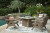 Ashley Carisbo Beige Outdoor Fire Pit Table and 4 Chairs