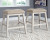 Ashley Skempton White Light Brown Counter Height Bar Stools (Set of 2)