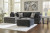 Ashley Biddeford Ebony 2-Piece Sectional with RAF Chaise and Ottoman