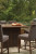 Paradise Trail Medium Brown Outdoor Bar Table and 6 Barstools