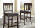 Haddigan Dark Brown Counter Height Dining Table and 6 Barstools PKG024555