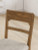 Ashley Cabalynn Oatmeal Light Brown Counter Height Barstool (Set of 2)