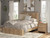 Ashley Dovander Warm Natural Brown Queen Panel Bed