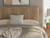 Ashley Dovander Warm Natural Brown Queen Panel Bed