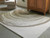 Ashley Rizwana Ivory Brown Gray 5' x 7' Area Rug