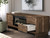 Ashley Zadilyn Brown 72" TV Stand with Electric Fireplace