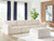 Ashley Canefield Ivory 4-Piece Sectional with Ottoman
