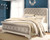 Ashley Realyn Chipped White Queen Sleigh Bed