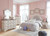 Ashley Realyn Chipped White Nightstand