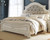 Ashley Realyn Chipped White King Upholstered Panel Bed