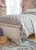 Ashley Realyn Chipped White King Upholstered Panel Bed