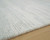 Ashley Genemost Ivory Blue 5' x 7' Area Rug