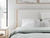 Ashley Cadmori Brown Queen Upholstered Panel Bed