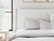 Ashley Cadmori Brown King Upholstered Panel Bed