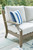 Ashley Rainier Ranch Brown Beige Outdoor Loveseat with Cushion