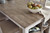 Ashley Skempton White Light Brown Counter Height Dining Table and Bar Stools (Set of 3)