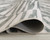 Ashley Verland Gray White Washable 7'6" x 9'6" Area Rug