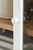 Ashley Dagandale Natural Black Accent Cabinet