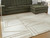 Ashley Farongrove Ivory Beige 7'10" x 10' Area Rug