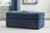 Benchcraft Evansley Navy Ottoman