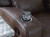 Ashley Lavenhorne Pebble Reclining Sofa with Drop Down Table