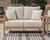 Ashley Hallow Creek Driftwood Outdoor Loveseat with Cushion
