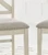 Ashley Robbinsdale Antique White Counter Height Barstool (Set of 2)