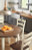 Ashley Woodanville Cream Brown Dining Drop Leaf Table