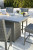 Ashley Palazzo Gray Outdoor Counter Height Dining Table with 4 Barstools