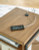 Ashley Fridley Brown Black End Table