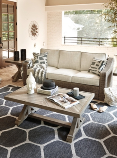 Ashley Beachcroft Beige Outdoor Sofa with Coffee Table and End Table